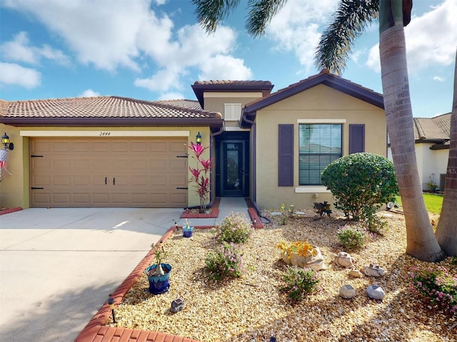 view of front of home with a garage