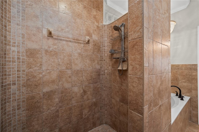 bathroom with crown molding and independent shower and bath