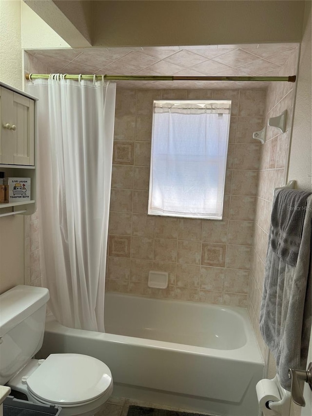 full bath with shower / tub combo with curtain and toilet