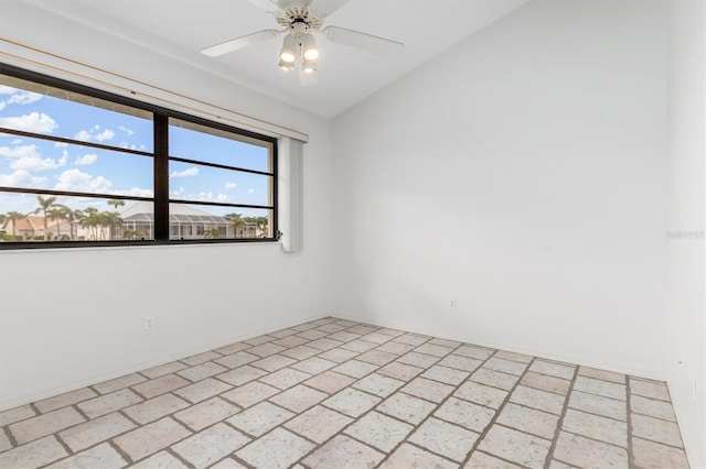 empty room with lofted ceiling and ceiling fan