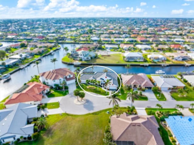 drone / aerial view featuring a water view