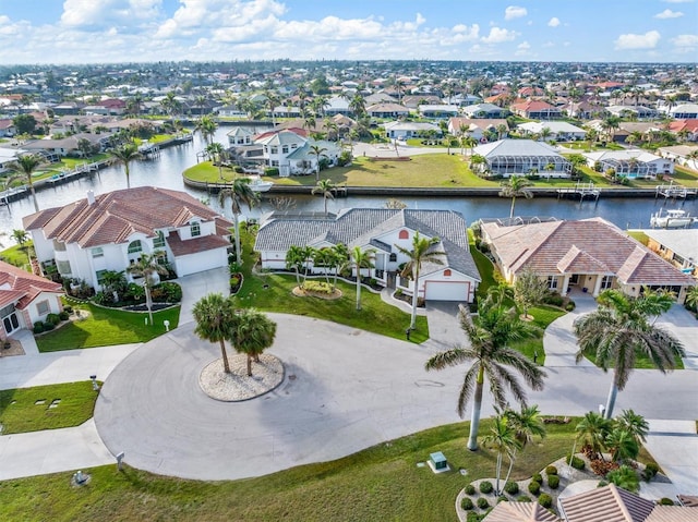 drone / aerial view featuring a water view