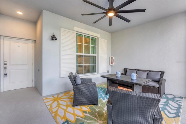 view of patio / terrace featuring a ceiling fan