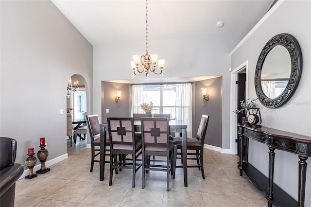 dining area featuring a chandelier and light tile patterned floors