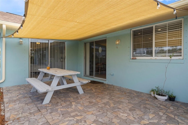 view of patio with outdoor dining area