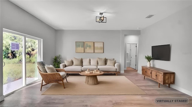 living room with light wood-type flooring