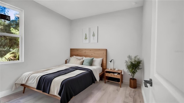 bedroom featuring light hardwood / wood-style flooring