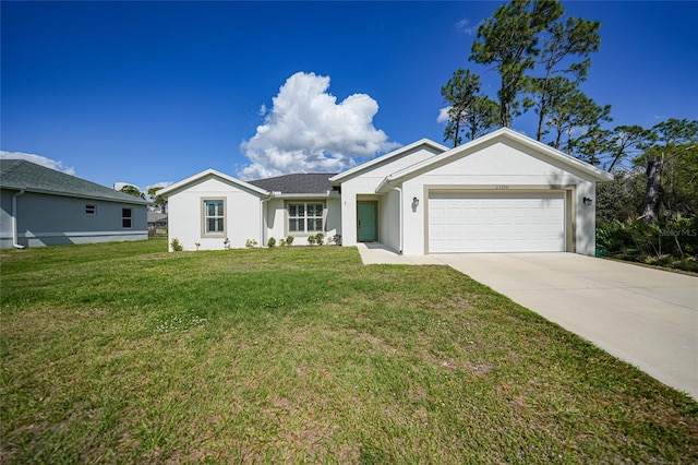 single story home featuring a garage and a front lawn