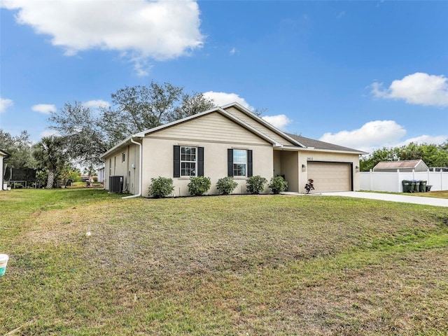 ranch-style home with a garage, a front yard, and central air condition unit