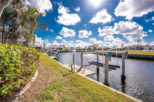 dock area with a water view