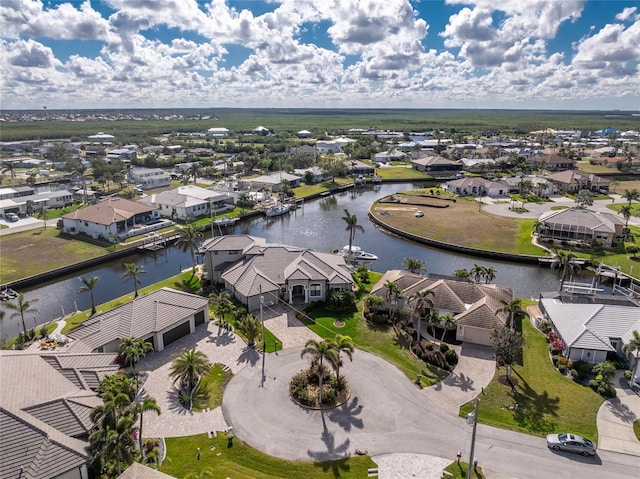 bird's eye view with a water view