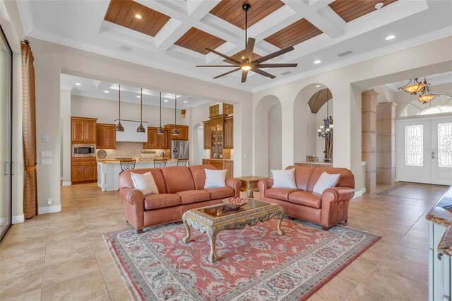 3321 Tripoli Blvd, Punta Gorda, FL 33950 - living room featuring french doors, light tile patterned flooring, coffered ceiling, ornamental molding, and beamed ceiling