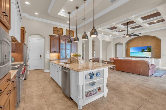 3321 Tripoli Blvd, Punta Gorda, FL 33950 - kitchen featuring sink, hanging light fixtures, an island with sink, stainless steel appliances, and white cabinets