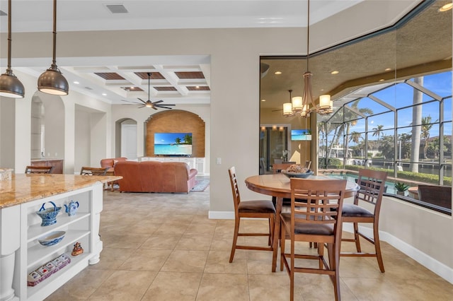 3321 Tripoli Blvd, Punta Gorda, FL 33950 - tiled dining area featuring coffered ceiling, beam ceiling, and ceiling fan