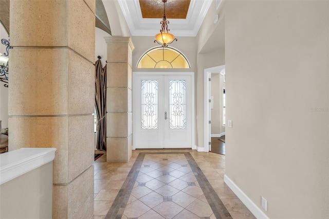 3321 Tripoli Blvd, Punta Gorda, FL 33950 - foyer with crown molding, a raised ceiling, and french doors