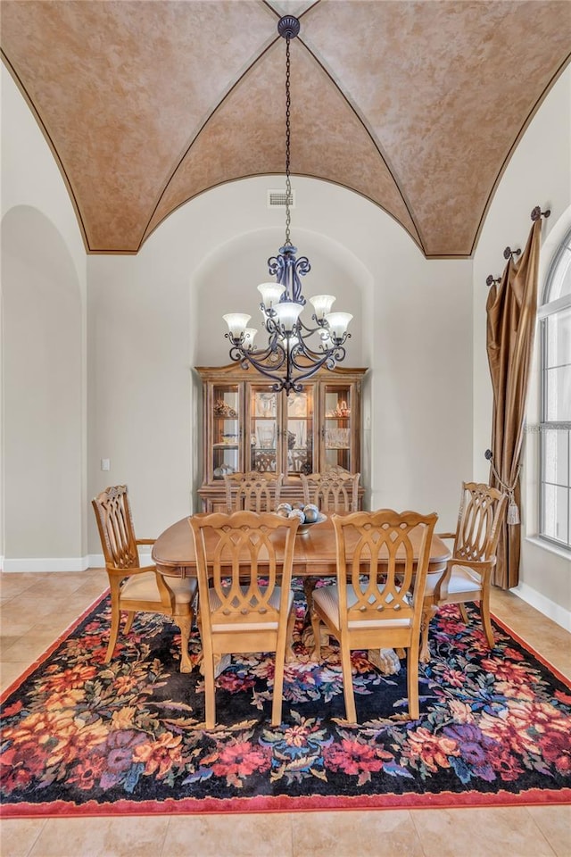 3321 Tripoli Blvd, Punta Gorda, FL 33950 - dining space with a notable chandelier and vaulted ceiling