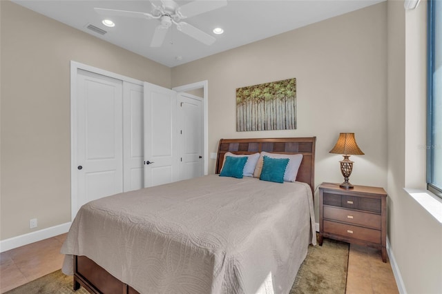 3321 Tripoli Blvd, Punta Gorda, FL 33950 - bedroom with light tile patterned flooring, ceiling fan, and a closet