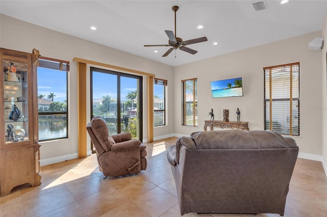 3321 Tripoli Blvd, Punta Gorda, FL 33950 - tiled living room with ceiling fan