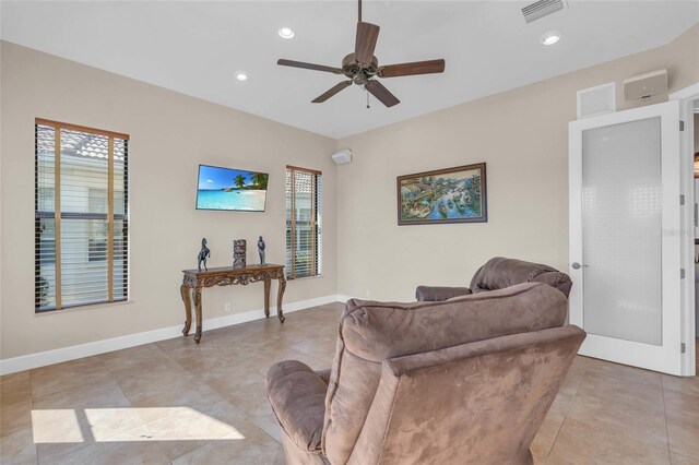 3321 Tripoli Blvd, Punta Gorda, FL 33950 - tiled living room featuring ceiling fan