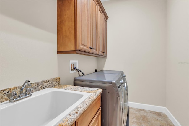 3321 Tripoli Blvd, Punta Gorda, FL 33950 - laundry area with washer and dryer, sink, and cabinets