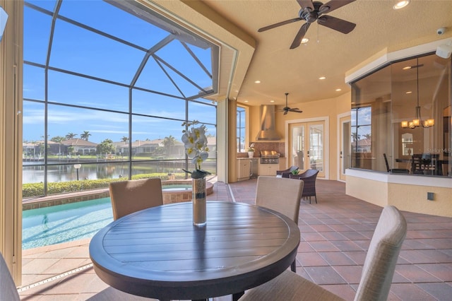 3321 Tripoli Blvd, Punta Gorda, FL 33950 - dining space with a water view, tile patterned floors, and a textured ceiling