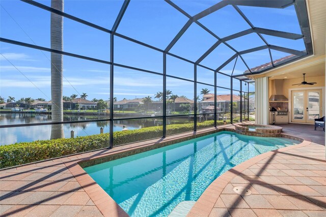 3321 Tripoli Blvd, Punta Gorda, FL 33950 - view of pool with a patio area, a water view, a lanai, an in ground hot tub, and ceiling fan