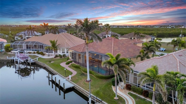 3321 Tripoli Blvd, Punta Gorda, FL 33950 - aerial view at dusk featuring a water view
