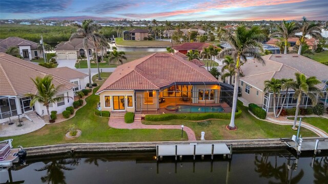 3321 Tripoli Blvd, Punta Gorda, FL 33950 - aerial view at dusk featuring a water view