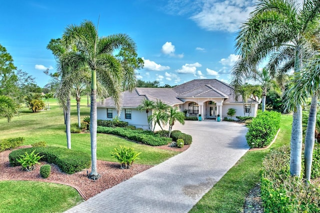 view of front of home with a front lawn