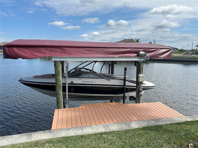 dock area featuring a water view and boat lift