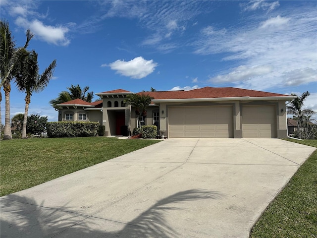 view of front facade with a garage, driveway, a front lawn, and stucco siding