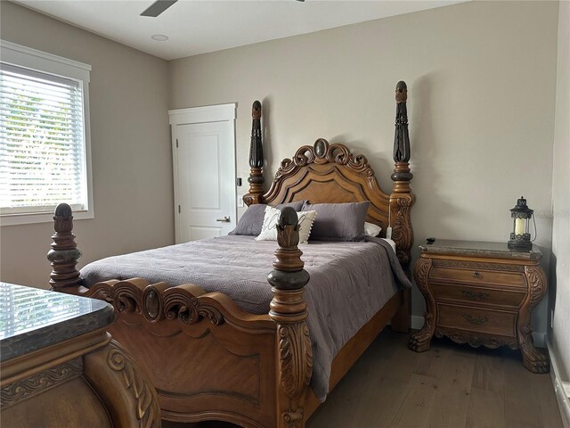 bedroom with wood finished floors