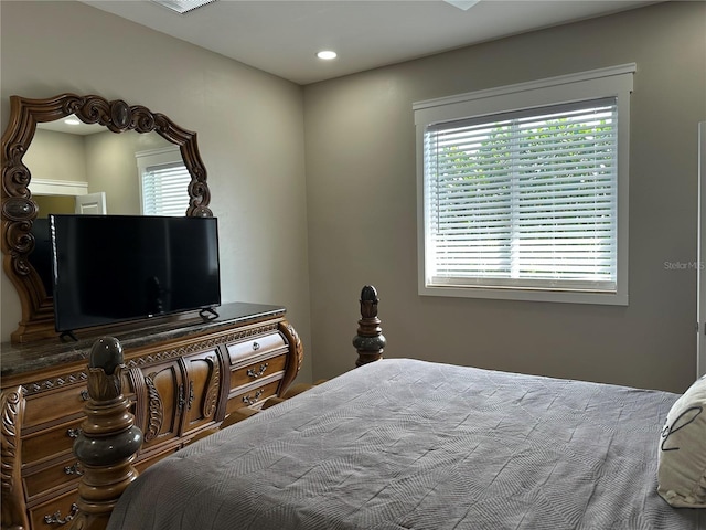 bedroom featuring recessed lighting