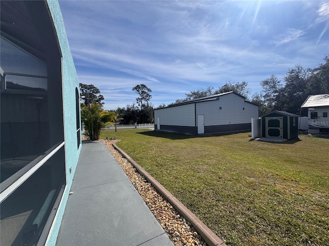 view of yard with a storage shed