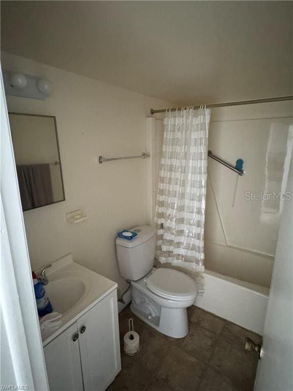 full bathroom with shower / tub combo, vanity, and toilet