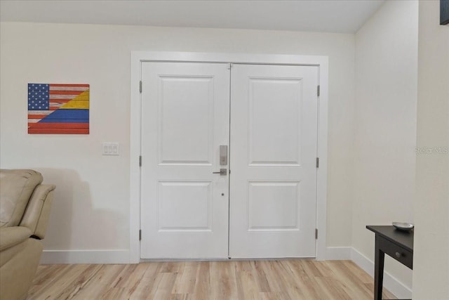 foyer featuring light wood-type flooring