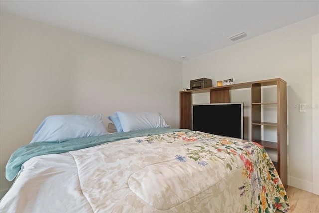 bedroom featuring light hardwood / wood-style flooring