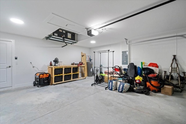 garage with gas water heater and electric panel