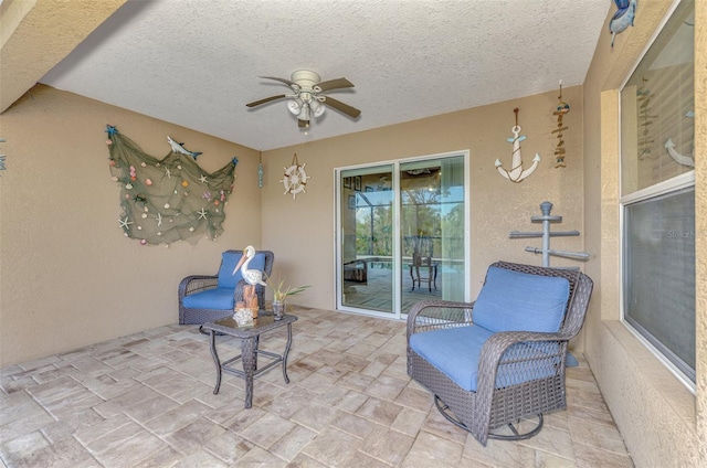 view of patio / terrace with ceiling fan