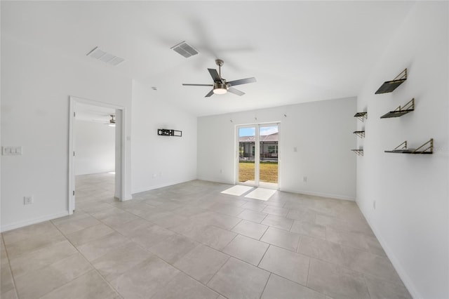 spare room featuring light tile patterned flooring, ceiling fan, and lofted ceiling