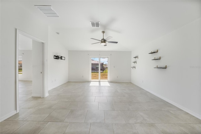 tiled empty room with ceiling fan