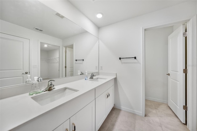 bathroom featuring vanity and tile patterned floors