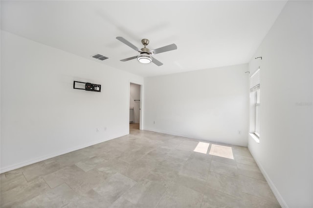 spare room with ceiling fan