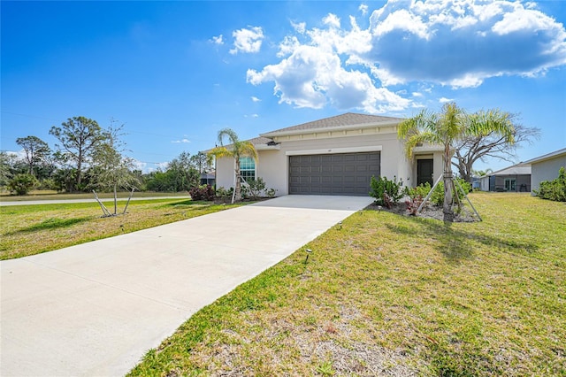 view of front of property featuring a garage and a front yard