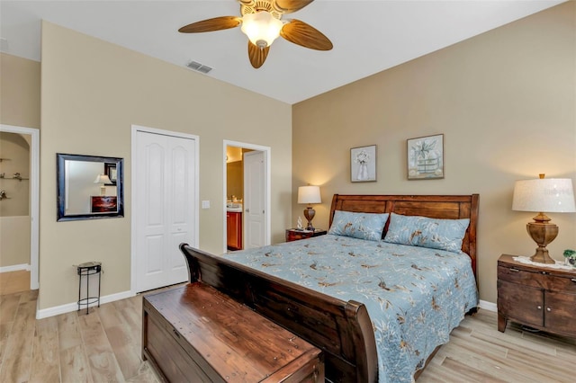 bedroom with a closet, ceiling fan, and light hardwood / wood-style flooring