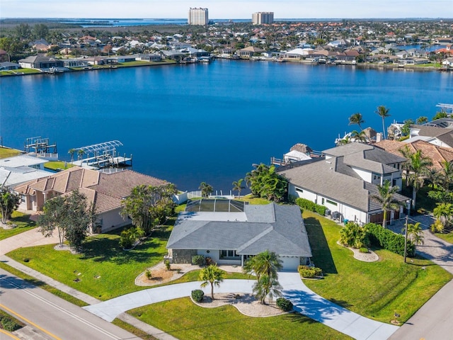 drone / aerial view with a water view