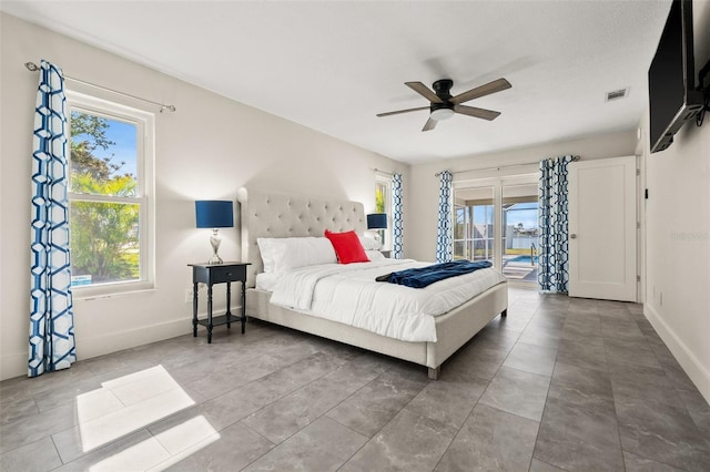 bedroom featuring access to exterior and ceiling fan