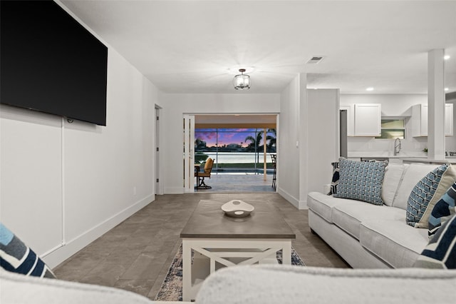 living room featuring sink