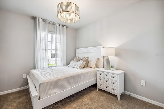 bedroom featuring carpet