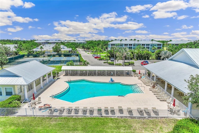 view of swimming pool featuring a patio area